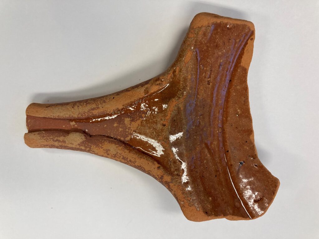 Handvat van een 15e eeuwse bakpan.